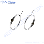 Load image into Gallery viewer, Silver hoop earrings featuring a black stone accent, perfect for women's daily wear
