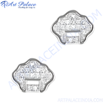 Load image into Gallery viewer, Close-up of intricate silver filigree stud earrings, showcasing a textured design and metallic shine.