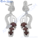 Load image into Gallery viewer, 925 sterling silver dangle earrings with three red garnet gemstones. Elegant women's jewelry.