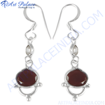Load image into Gallery viewer, 925 sterling silver drop earrings featuring a deep red garnet gemstone. The earrings are designed for women.