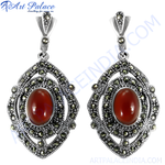 Load image into Gallery viewer, 925 sterling silver drop earrings with a red garnet center stone and marcasite accents.