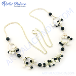 Load image into Gallery viewer, Silver chain necklace with black and white beads on white background