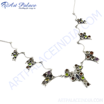 Load image into Gallery viewer, Sterling silver statement necklace with various colorful gemstones. Features amethyst, peridot, and garnet.