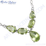 Load image into Gallery viewer, Sterling silver necklace featuring pear and oval cut green peridot gemstones, perfect women's jewelry.
