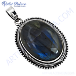 Load image into Gallery viewer, 925 sterling silver oval labradorite pendant with blue and grey flashes of color.