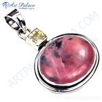 将图像加载到图库查看器中, Sterling silver pendant featuring a large oval pink rhodochrosite gemstone and a small square yellow citrine.