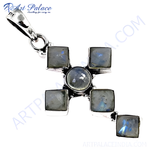 Load image into Gallery viewer, Sterling silver cross pendant with central round moonstone and square moonstone accents, shimmering blue and gray tones.