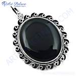 Load image into Gallery viewer, 925 sterling silver onyx pendant with a large, oval-shaped black gemstone.