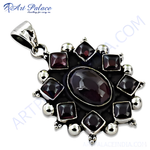Load image into Gallery viewer, 925 sterling silver pendant featuring a central oval garnet stone surrounded by smaller square garnets, elegant design