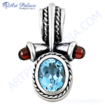 Load image into Gallery viewer, 925 sterling silver pendant with a central oval blue topaz gemstone and two side stones, elegant jewelry.