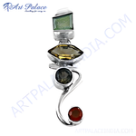 Load image into Gallery viewer, Sterling silver pendant with green, yellow and red gemstones, a statement piece of jewelry.