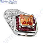 Load image into Gallery viewer, Silver ring with a large orange gemstone and surrounding rubies, set in a polished silver band.