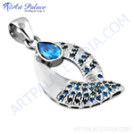 Load image into Gallery viewer, 925 sterling silver pendant with a pear-shaped blue gemstone and accents.