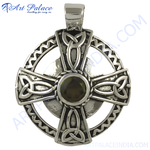 Load image into Gallery viewer, 925 sterling silver Celtic cross pendant with a central green gemstone, ideal as a religious gift.