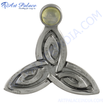 Load image into Gallery viewer, Sterling silver Celtic knot pendant with a gemstone accent, showcasing a detailed design.