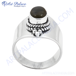 Load image into Gallery viewer, Sterling silver ring with a dark gemstone, showcasing a polished and elegant design.