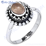 Load image into Gallery viewer, 925 sterling silver ring with oval-shaped, light brown gemstone center and a detailed band