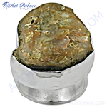 将图像加载到图库查看器中, Sterling silver ring with a unique, textured stone set in a silver band. The stone has earthy tones.