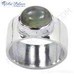 Load image into Gallery viewer, Sterling silver ring with a large, round green gemstone in a polished setting.