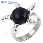 Load image into Gallery viewer, Sterling silver claw ring featuring a large, round, black gemstone, perfect as a unique statement piece.