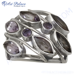 Load image into Gallery viewer, Sterling silver ring with multiple amethyst gemstones arranged in a unique leaf-like design.