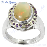 Load image into Gallery viewer, 925 sterling silver opal ring with amethyst accents, showcasing an oval opal gemstone set in a silver band.