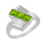 Load image into Gallery viewer, Sterling silver ring featuring rectangular-cut peridot gemstones, green and silver ring for women.