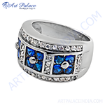 Load image into Gallery viewer, Sterling silver ring with blue sapphire and white cubic zirconia gemstones in a floral design