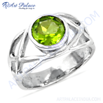 Load image into Gallery viewer, 925 sterling silver peridot ring, featuring a round, vibrant green gemstone in a unique openwork design.