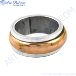 Load image into Gallery viewer, Silver and copper spinner ring, featuring a rotating band for anxiety relief and daily wear.