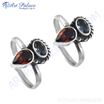 Load image into Gallery viewer, 925 Sterling Silver Toe Rings featuring pear-shaped garnet and oval blue topaz gemstones.