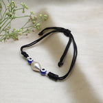 Load image into Gallery viewer, Black Cord Adjustable Bracelet with Silver Bead and Evil Eye Charms