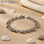 Load image into Gallery viewer, Silver anklet with dangling bells on a white background, perfect for women's fashion and accessories.
