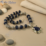 Load image into Gallery viewer, Silver beaded necklace with blue gemstone pendant, perfect for a gift or daily wear, featuring intricate silver work.