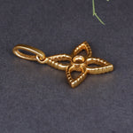 将图像加载到图库查看器中, Close-up of a textured gold-plated four-petal flower pendant charm with a central round opening