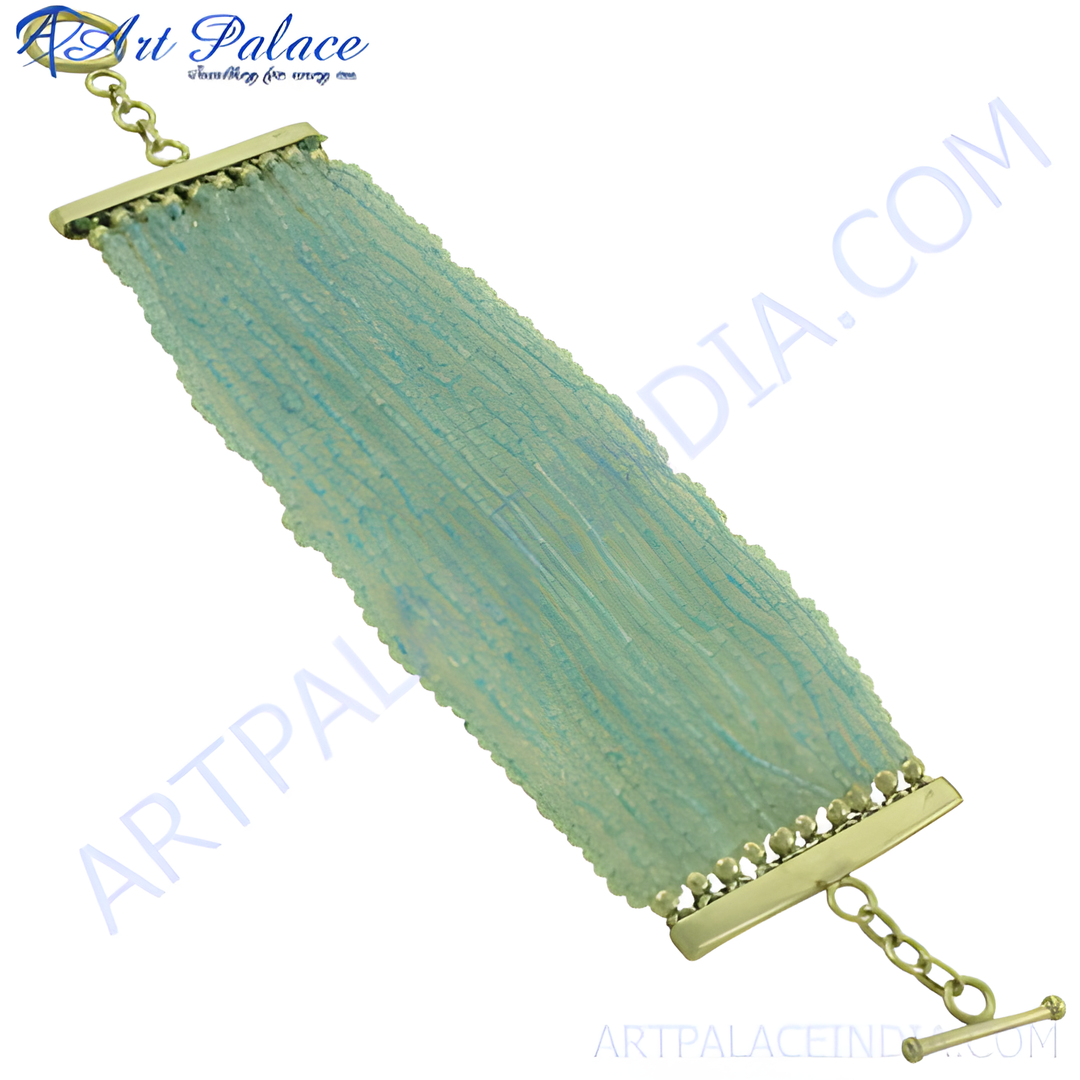 Multi-strand aquamarine beaded bracelet with gold-toned clasp, featuring delicate blue beads.