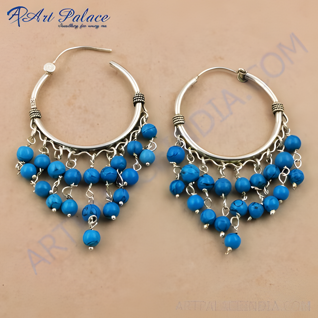 925 sterling silver dangle earrings featuring turquoise beads. Turquoise and silver earrings with blue gemstones.