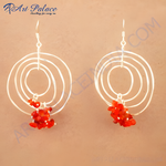 Load image into Gallery viewer, 925 sterling silver dangle earrings featuring a multi-circle design and vibrant red gemstones.
