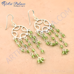 Load image into Gallery viewer, 925 sterling silver dangle earrings with vibrant green peridot gemstones.
