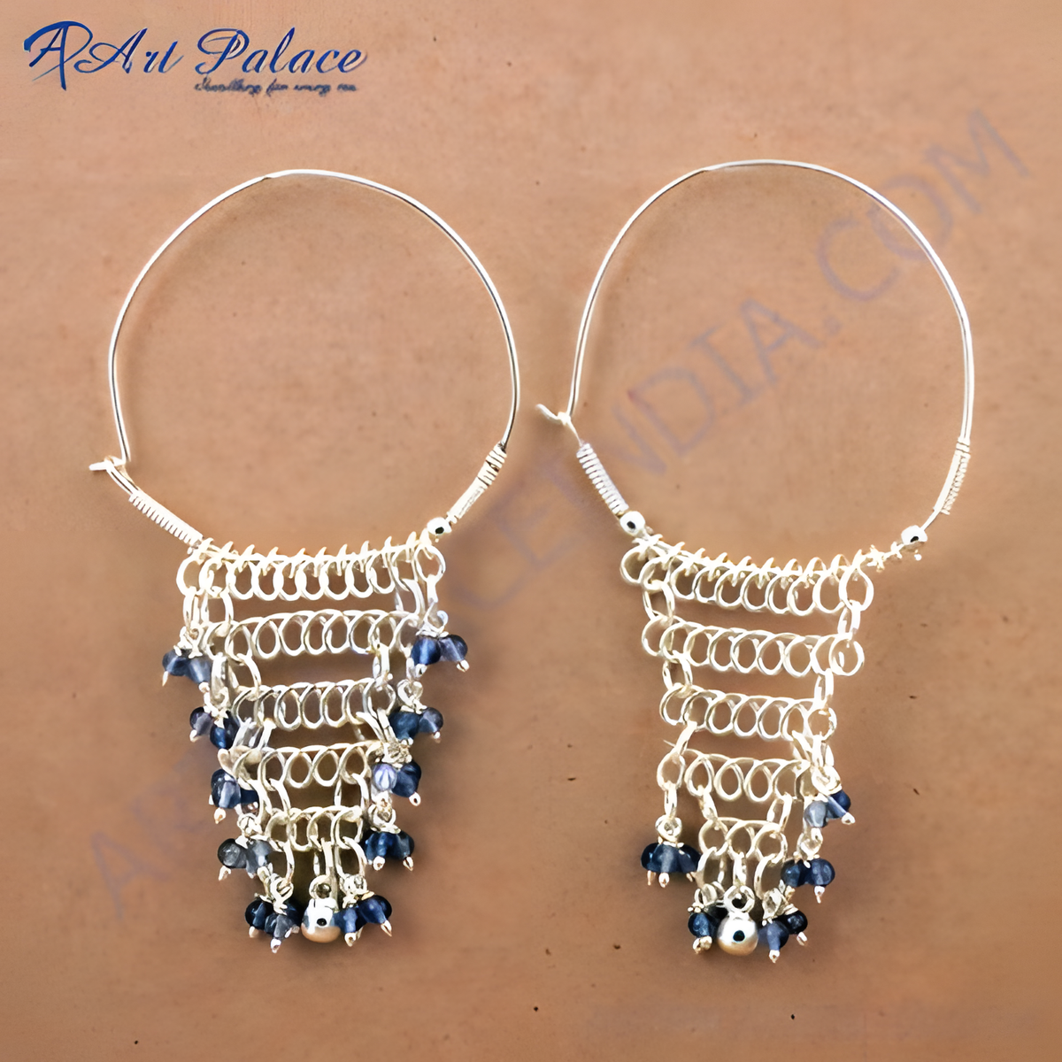 Sterling silver hoop earrings with a cascade of blue gemstones for women
