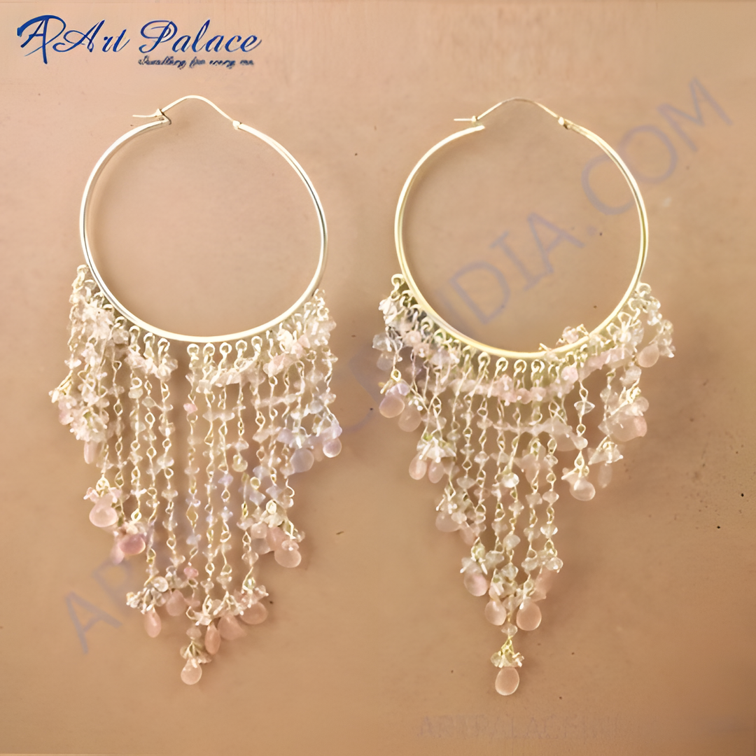 Gold hoop earrings with cascading strands of light pink gemstones, creating a beautiful dangle effect.