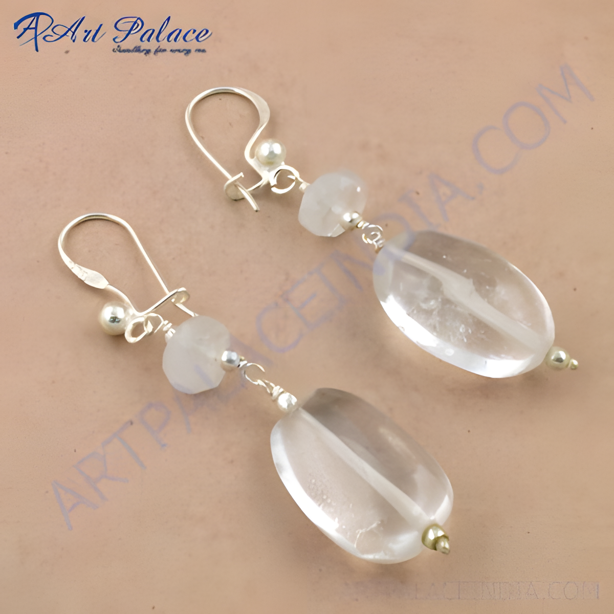 Sterling silver drop earrings featuring clear quartz gemstones, a classic and elegant design perfect for everyday wear