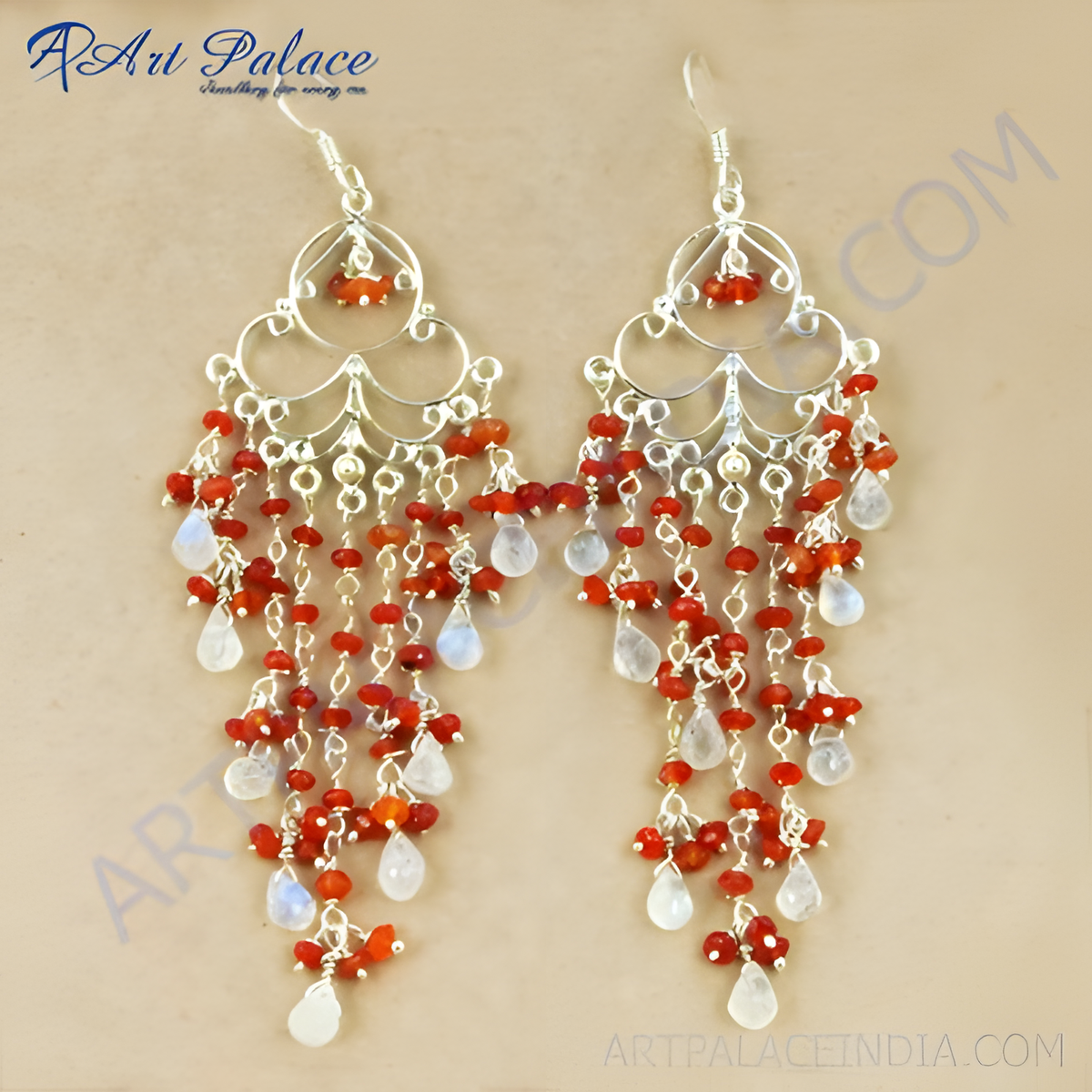 Silver dangle chandelier earrings with red beads and white moonstone gemstones