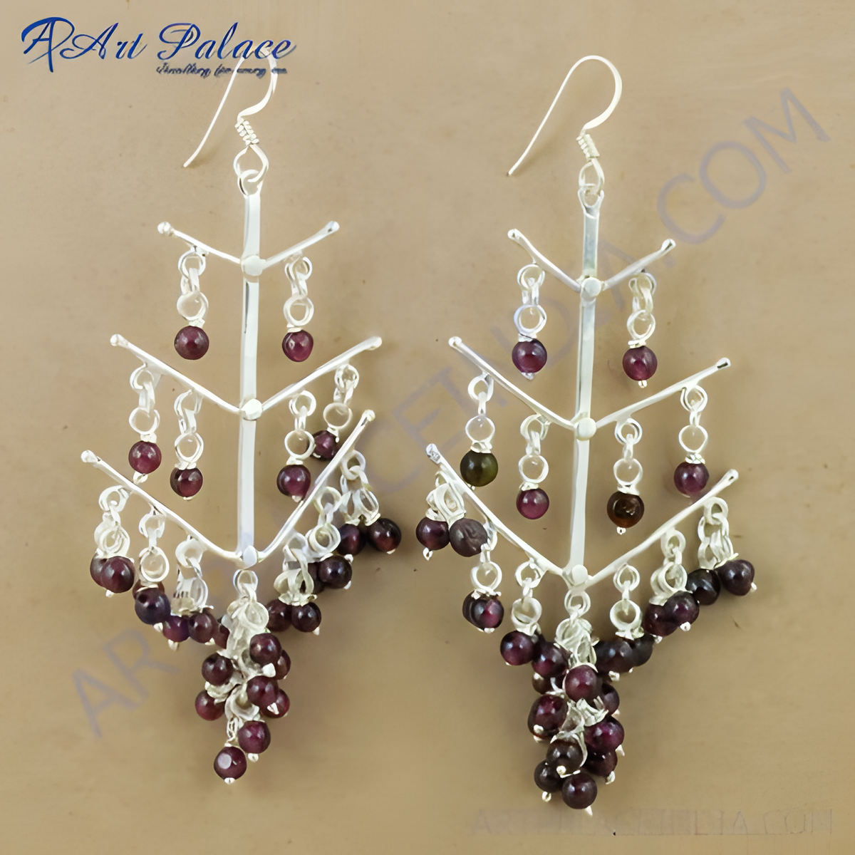 Sterling silver dangle earrings with garnet gemstones