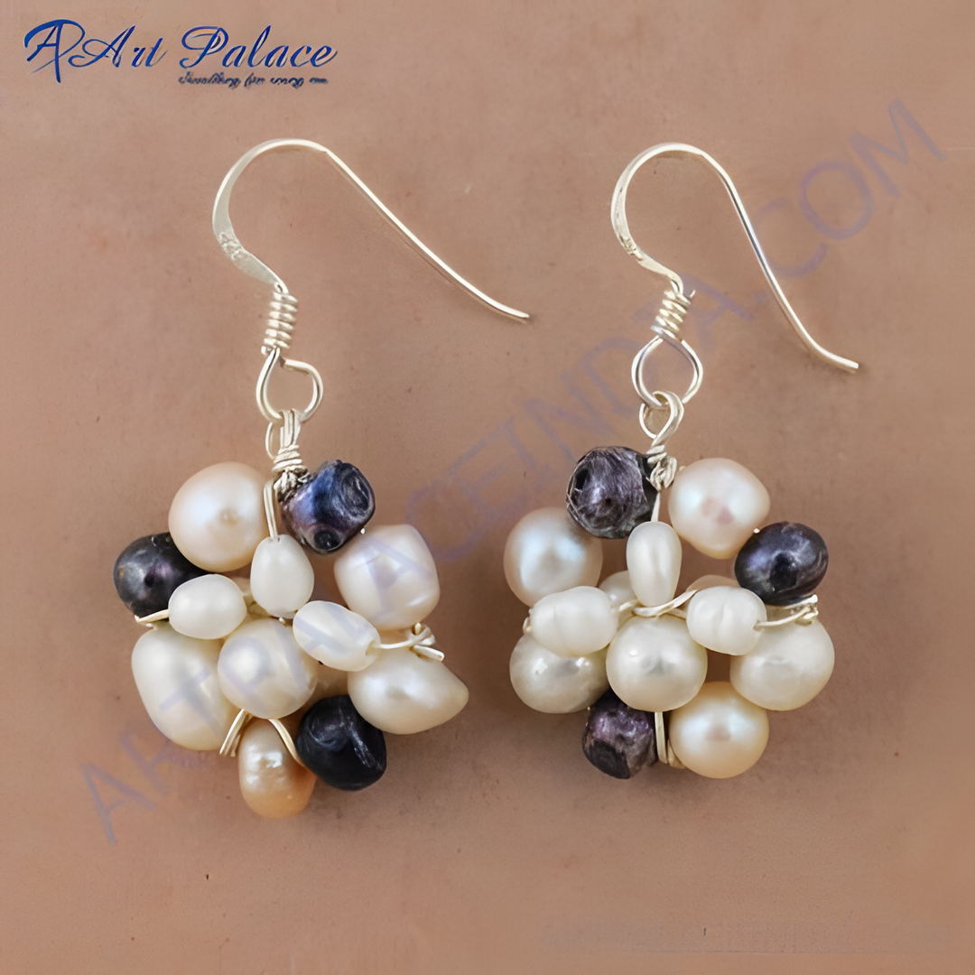Sterling silver dangle earrings with a cluster of white, cream, and dark gray freshwater pearls.