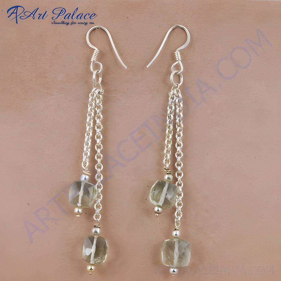 925 sterling silver dangle earrings with green faceted gemstone accents.