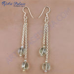 Load image into Gallery viewer, 925 sterling silver dangle earrings with green faceted gemstone accents.
