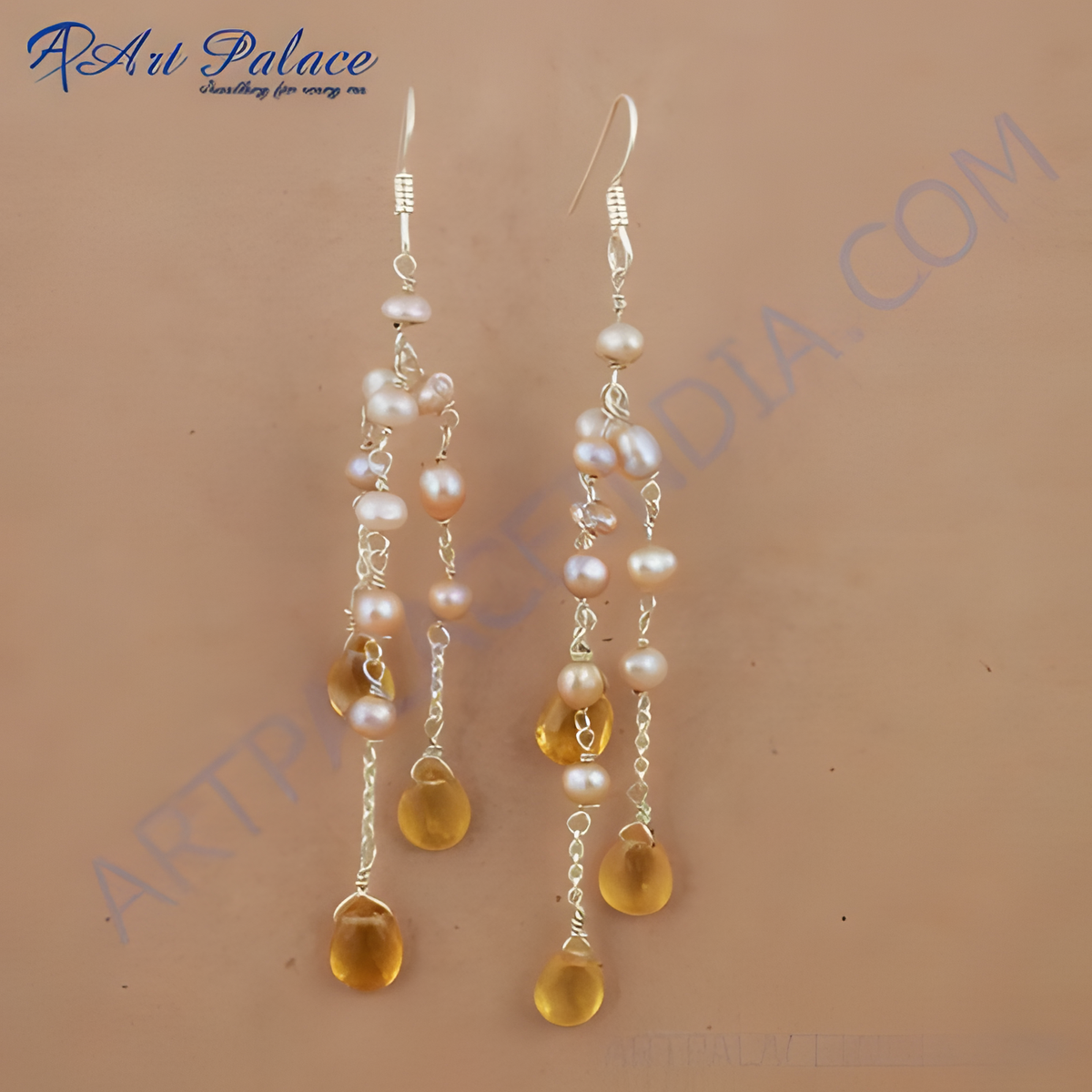 Sterling silver dangle earrings with pearls and citrine gemstones, featuring a hook closure