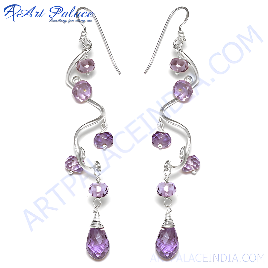 Sterling silver dangle earrings with faceted purple amethyst gemstones on a white background.