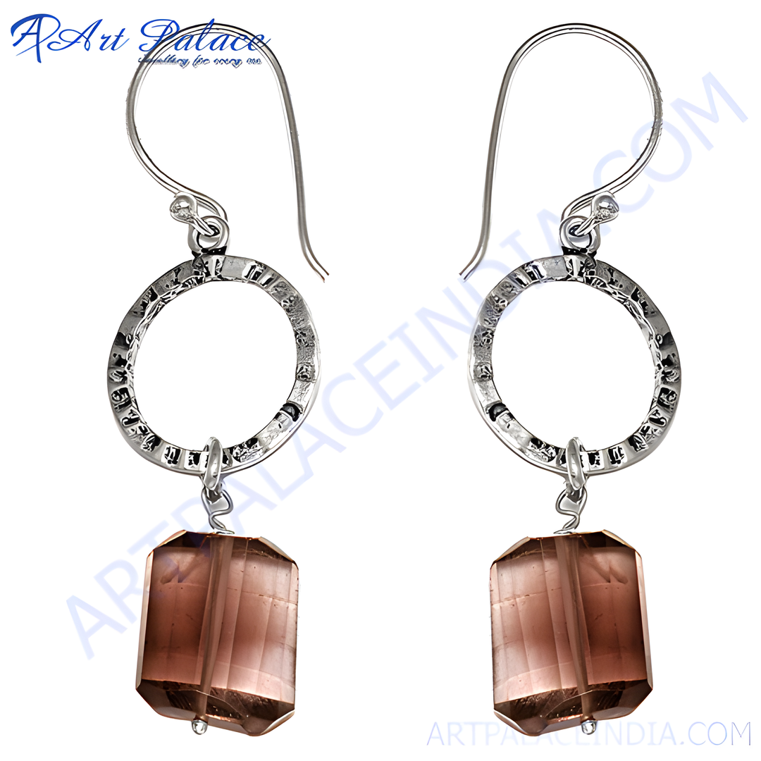 Silver drop earrings with faceted brown gemstone. Elegant women's jewelry.